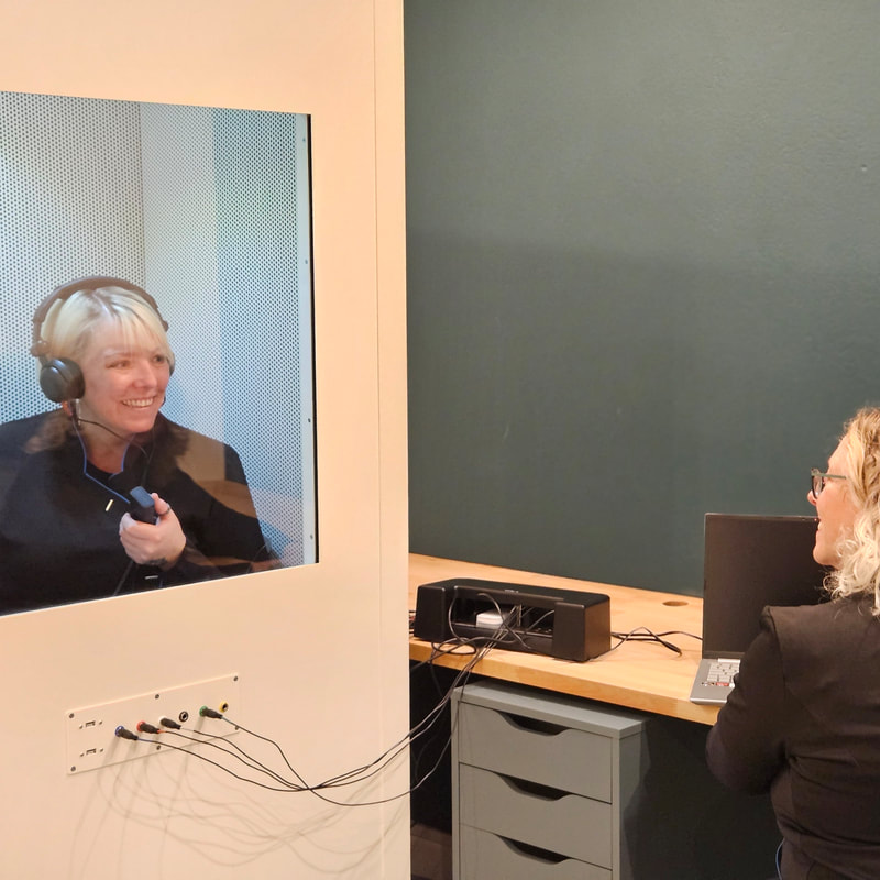 the sound treated environment being used for a hearing test 