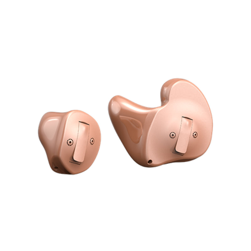 in the ear skin colour hearing aids showing its small design and parts 